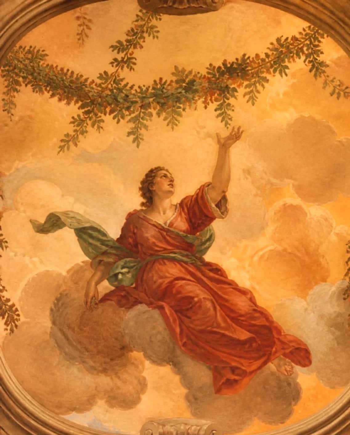 A painted ceiling: a figure in a red robe with a green sash reaching up through golden clouds beneath a garland of leaves